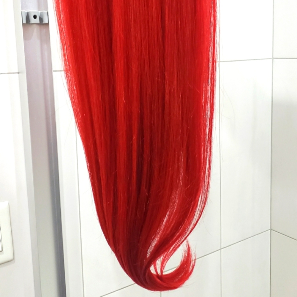 7 piece 22 inch Red Human Hair Extensions.